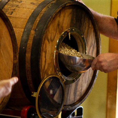 Green Arabica coffee beans rest in a recently emptied barrel for some time to take on the exquisite aromas of Richland Rum
