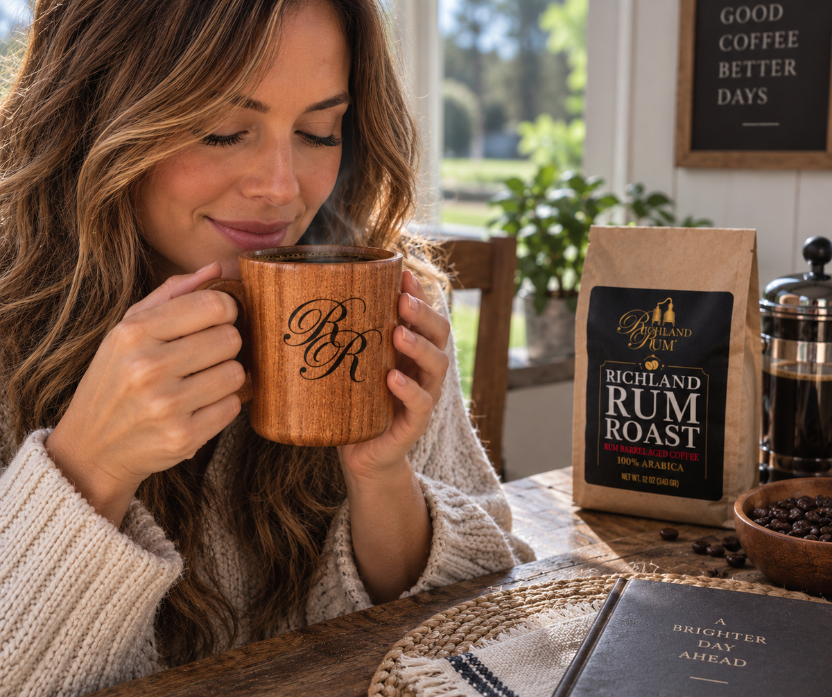 a woman enjoying Richland Rum Roast from a wooden cup