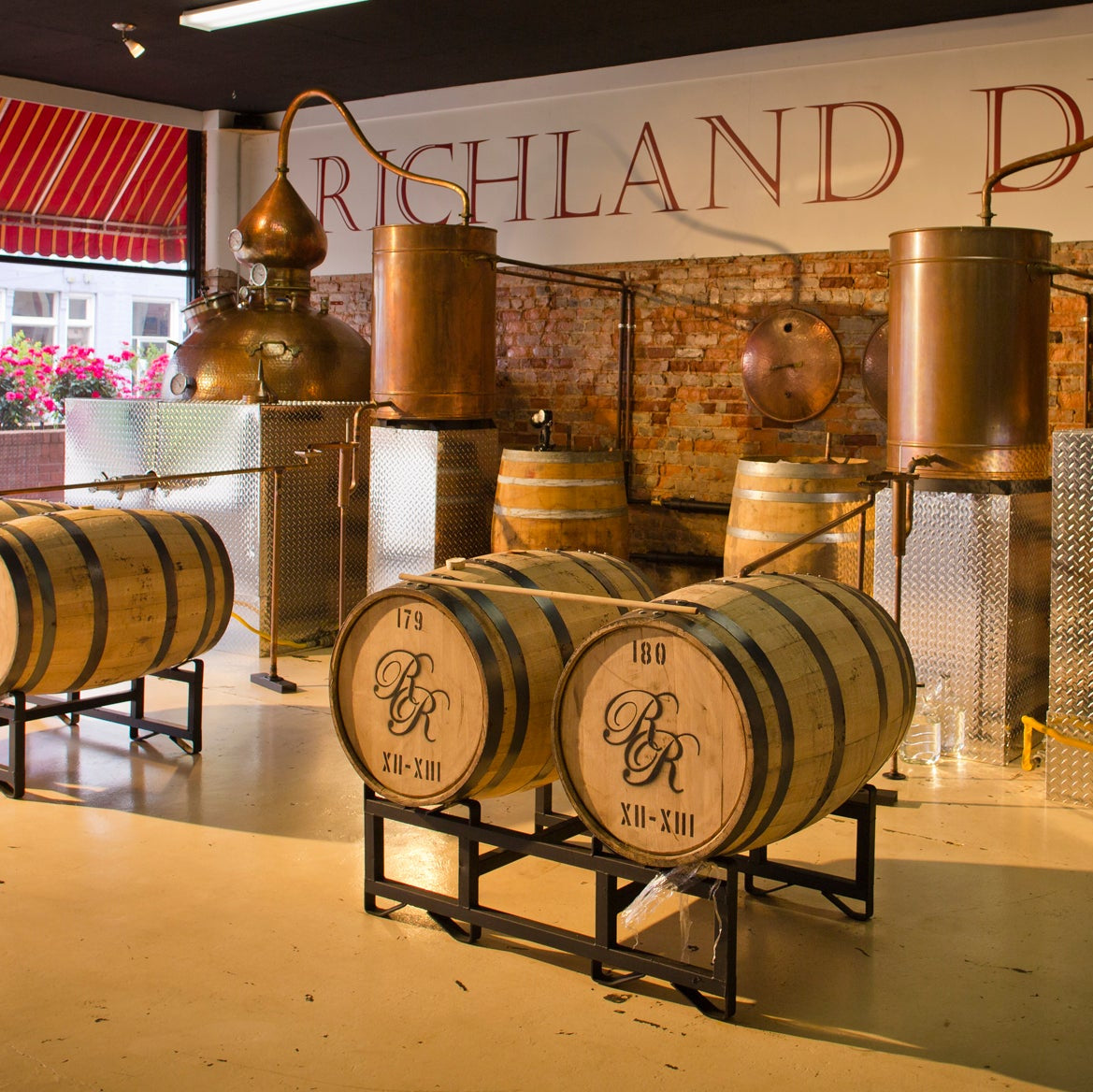 Small copper pot stills make high end artisan single estate rum in one of several building in downtown Richland