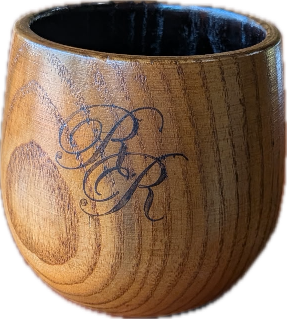 Wooden sipping cup with RR monogram